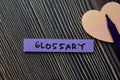 Glossary write on sticky notes isolated on office desk Royalty Free Stock Photo