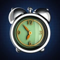 Glossy alarm clock on blue background Royalty Free Stock Photo