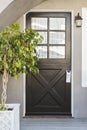 Glossy black door of a family home Royalty Free Stock Photo