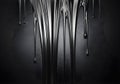 Glossy Black Liquid Drips on Textured Surface Royalty Free Stock Photo
