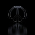 Glossy black peace symbol on a dark reflective surface Royalty Free Stock Photo