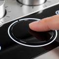 A glossy black touchscreen or button panel surrounded by a circular Royalty Free Stock Photo