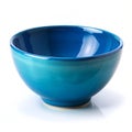 Glossy ceramic blue bowl isolated on white background generated by AI Royalty Free Stock Photo