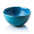 Glossy ceramic blue bowl isolated on white background generated by AI Royalty Free Stock Photo