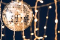 glossy disco ball with garland