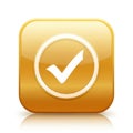 Glossy gold button with a white checkmark indicating approval or confirmation Royalty Free Stock Photo