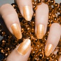 Glossy golden nails