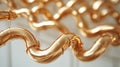 Glossy golden pipes forming an intricate interconnected pattern
