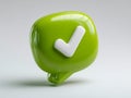 Glossy green chat bubble icon with white checkmark symbol representing confirmation and approval on a clean white background Royalty Free Stock Photo