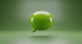 Glossy Green Speech Bubble Floating Against a Soft Gradient Background chat bubble message icon Royalty Free Stock Photo
