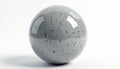 Glossy grey sphere with black speckles rests on white background. Minimalist, abstract object with smooth, round surface, Royalty Free Stock Photo