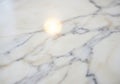 Glossy marble surface featuring a mix of creamy white and light grey tones with Royalty Free Stock Photo