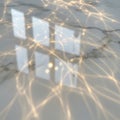 A glossy marble surface reflecting window light patterns. The marble features subtle gray veining Royalty Free Stock Photo