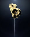 Glossy metallic golden balloon in shape of bitcoin cryptocurrency symbol. financial bubble concept 3d rendering