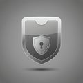 A glossy, metallic shield icon displayed Royalty Free Stock Photo