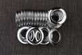 Glossy nickel-plated or chrome-plated Eyelets for attaching curtains in the design workshop