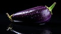 Glossy purple black eggplant close up with dramatic lighting and shallow depth of field