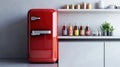 A glossy red mini fridge designed for storing beverages and snacks Royalty Free Stock Photo