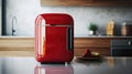 A glossy red mini fridge designed for storing beverages and snacks Royalty Free Stock Photo