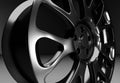 Glossy rim wheel car accessories in dark scene