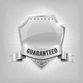 Glossy security silver shield - GUARANTEED Royalty Free Stock Photo