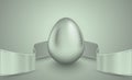 Glossy silver egg with white winding tape. Grey light retro ribbon background idea. Vintage banner, card, poster for Easter,
