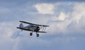 Gloster Gladiator aircraft in flight with cloud and blue sky background Royalty Free Stock Photo