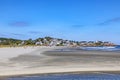 Gloucester beach with village at horizon Royalty Free Stock Photo