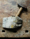 Glove holding hammer Royalty Free Stock Photo