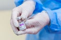 Gloved doctor holds a coronavirus vaccine in his hands. May 5, 2021, Balti Moldova, Illustrative editorial