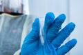 Gloved Hand with Coronavirus Swab Sample Royalty Free Stock Photo