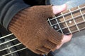 Gloved Hand on Frets Royalty Free Stock Photo