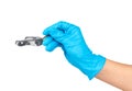 Gloved hand holding a metal impression tray Royalty Free Stock Photo