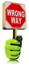 Gloved Hand Holding a Stop Road Sign with Text Wrong Way