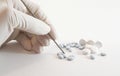 Gloved hand and medicinal pills Royalty Free Stock Photo