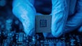 gloved hands hold cpu over circuit board Royalty Free Stock Photo