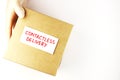 Gloved hands transmit the package with corona virus, safe courier delivery, contactless delivery Royalty Free Stock Photo