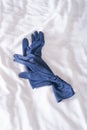 Gloves on bed