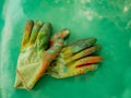 Gloves workers painting protective equipment