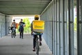 Glovo delivery biker in urban contest