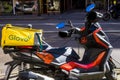Glovo motorbike parked on the pavement after the company was fined again for infringement of labour laws, Madrid Spain