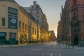 The glow of dawn on an empty city street Royalty Free Stock Photo