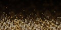 Glow light effect. Gold glitter particles background. Royalty Free Stock Photo