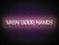 Glow Signboard with Wash Your Hands Inscription Royalty Free Stock Photo