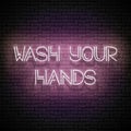 Glow Signboard with Wash Your Hands Inscription Royalty Free Stock Photo