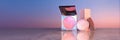 Glow up Essentials Featuring Highlighter, Blush, and Gloss on a Reflective Surface at Sunset Royalty Free Stock Photo