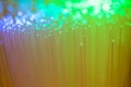 Glowing abstract multi color optical fibres close up macro shot Royalty Free Stock Photo