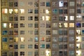 Glowing apartment windows at night where each occupant has his own privacy in the well planned high rise. Electrical power