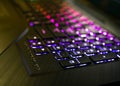 Glowing Asus Rog gaming laptop keyboard close up shot. Royalty Free Stock Photo