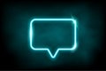 Glowing azure neon speech bubble sign. Electric light rectangle frame isolated on dark background with fog. Vector